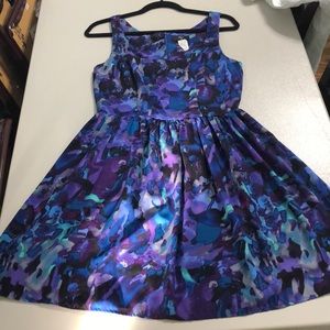 Gorgeous purple patterned dress.